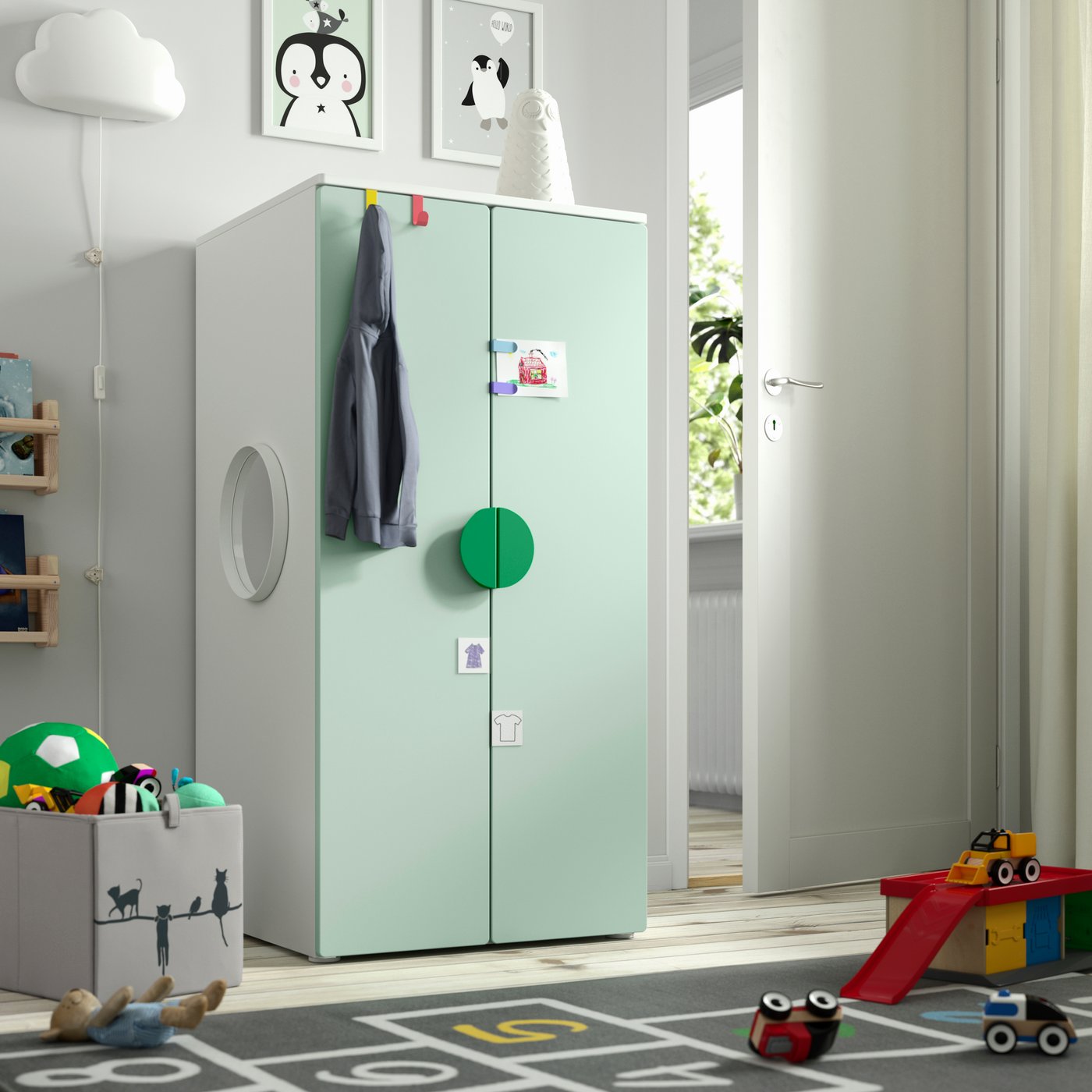 A white/light green PLATSA wardrobe