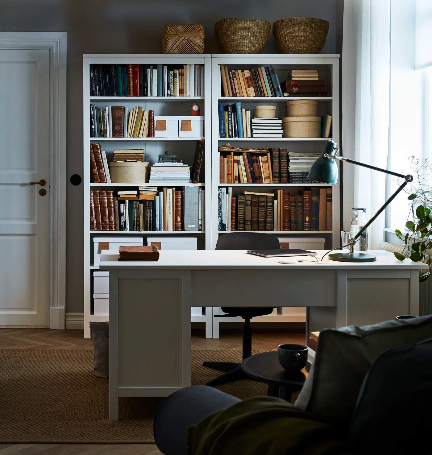 A beige KVARNVIK storage box in the home office