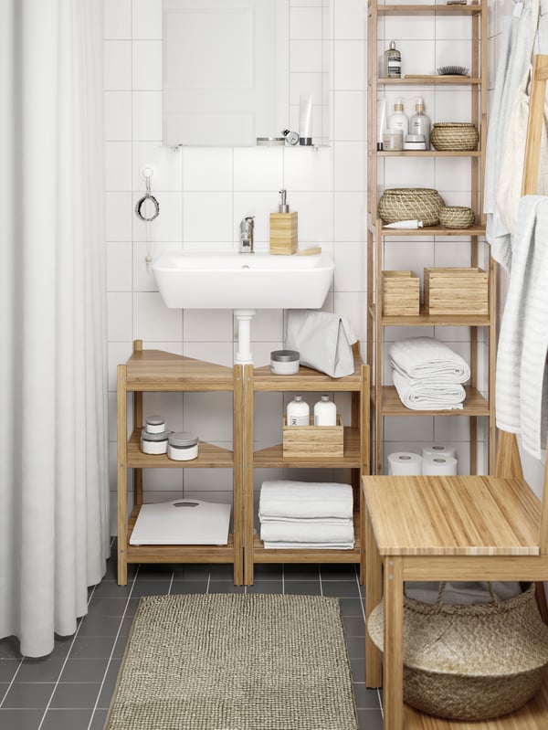 A white TYNGEN single wash-basin in the bathroom
