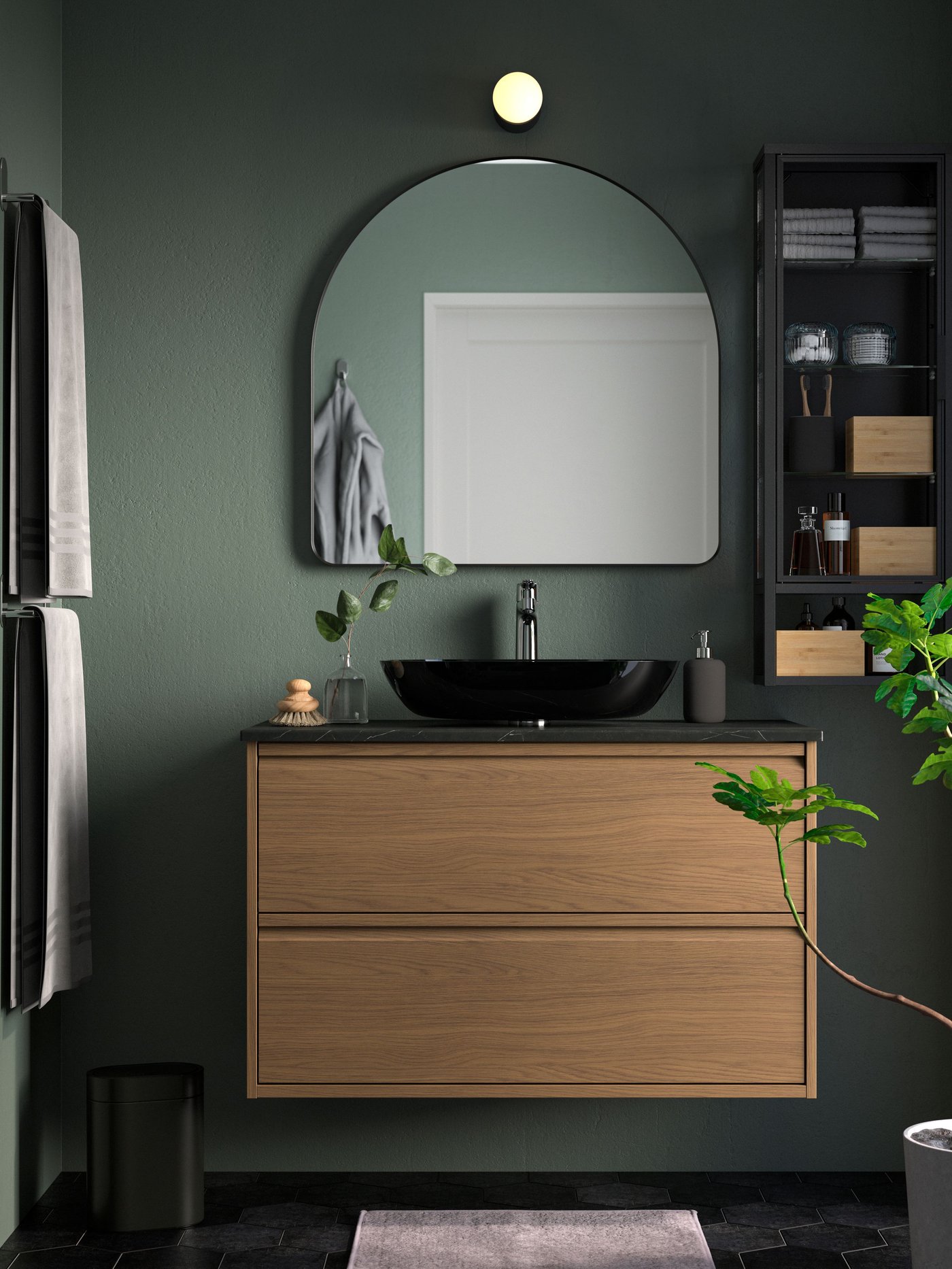 A black LINDBYN mirror in the bathroom