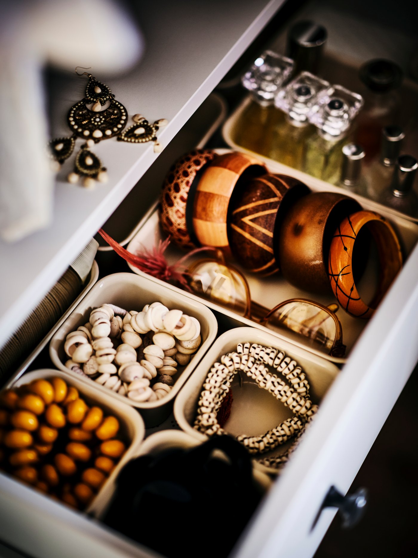 bracelets and accessories inside a drawer