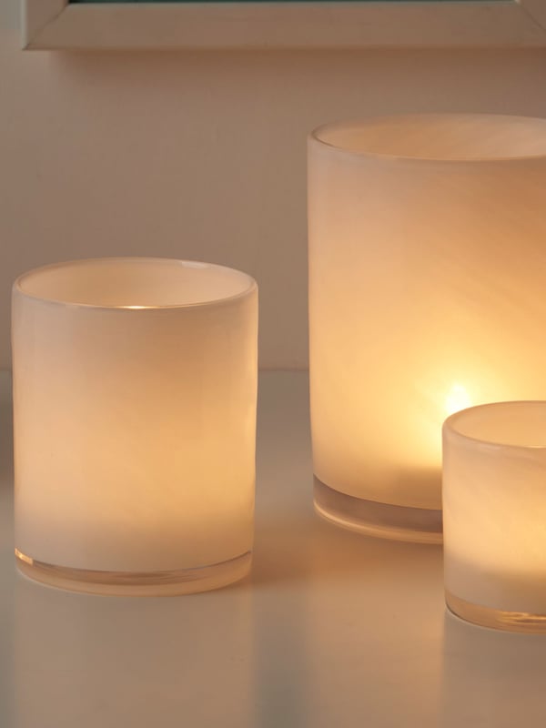 A white VINDSTILLA candle holder