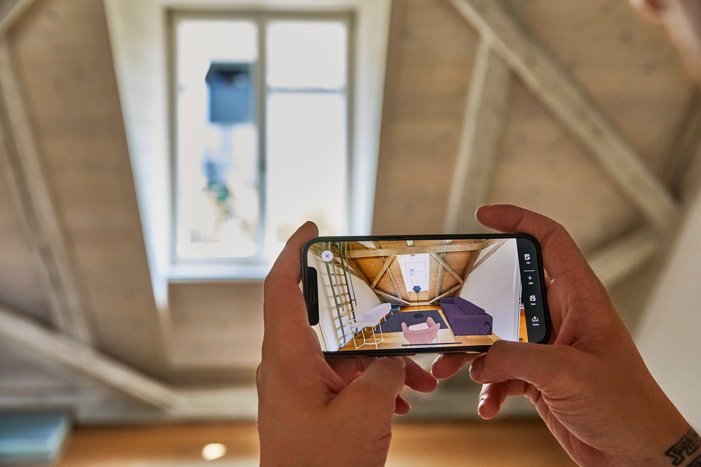 A woman uses IKEA Kreativ to visualise her attic space
