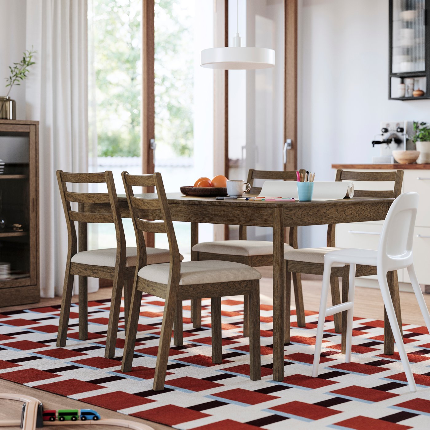 A brown stained oak veneer TONSTAD table in the dining room