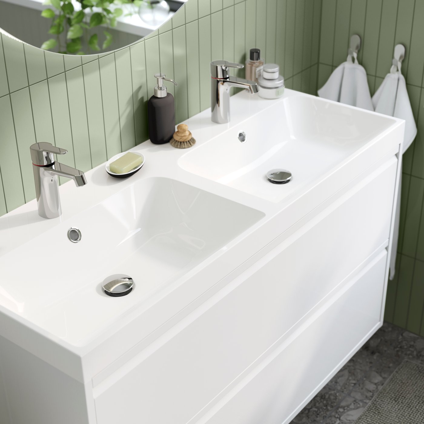 A white BACKSJÖN double wash-basin with water trap