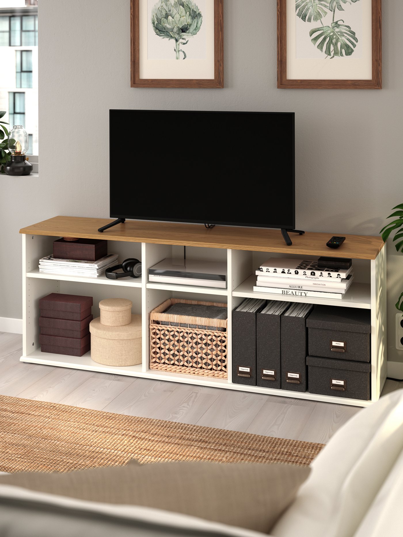 IKEA SKRUVBY white TV bench with a wood top and storage shelves