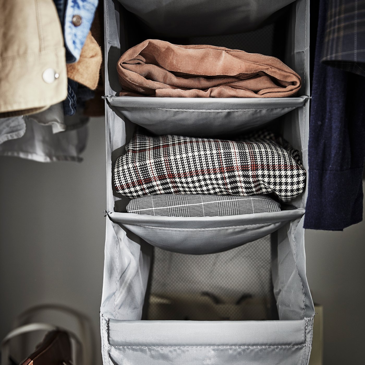 A dark grey SKUBB storage with 9 compartments