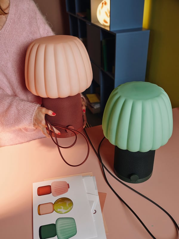 A red brown/pink KULGLASS Bluetooth speaker lamp in the NA