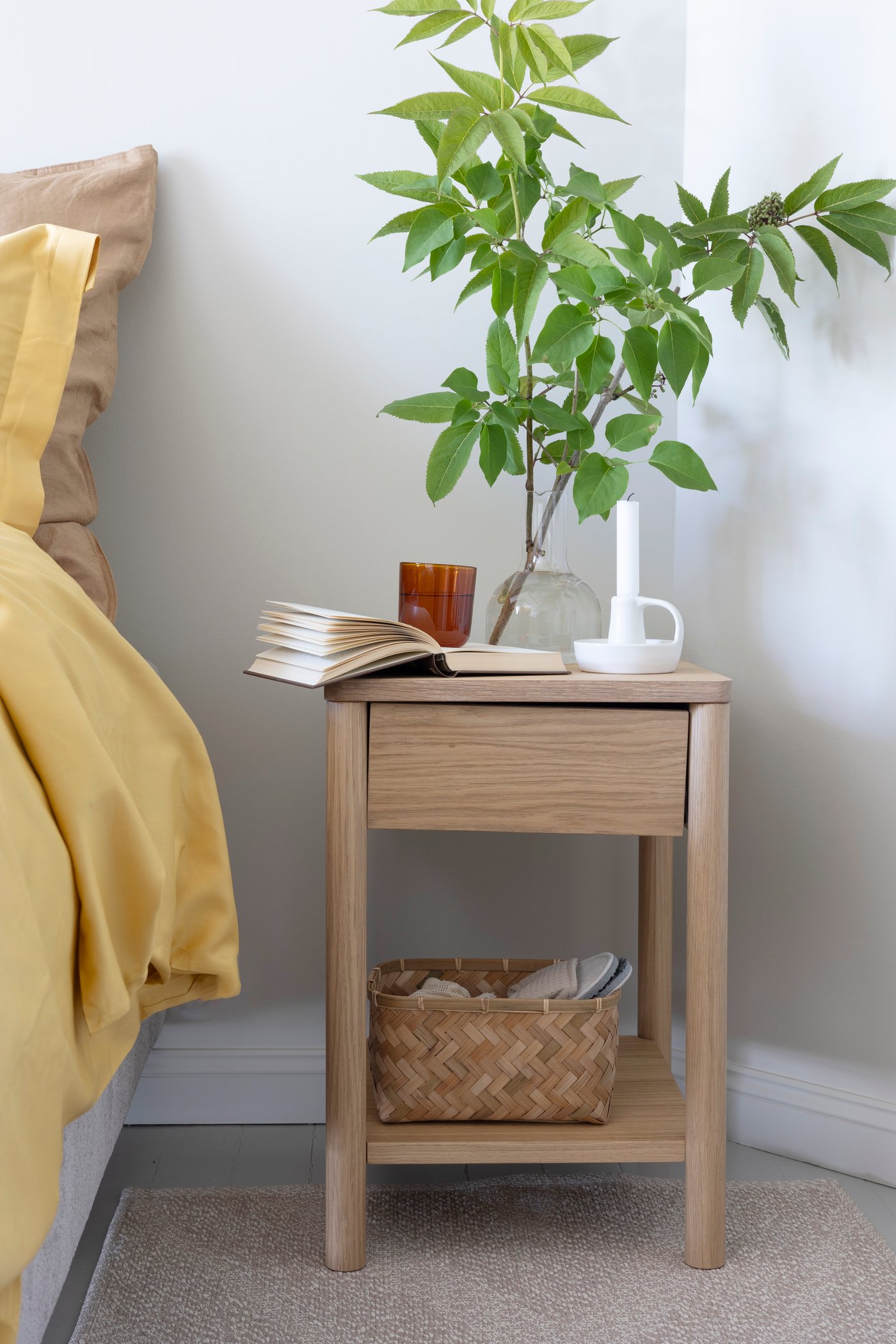 An yellow LUKTJASMIN duvet cover and pillowcase