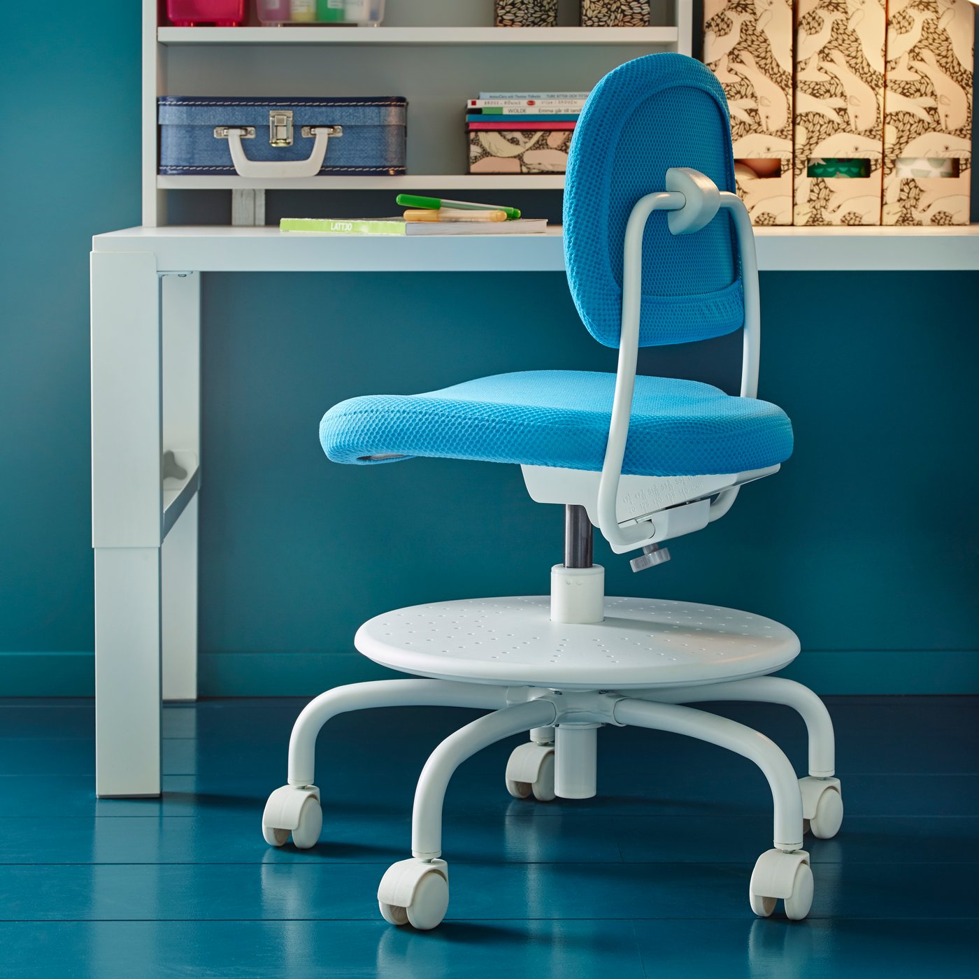 A bright blue VIMUND children's desk chair