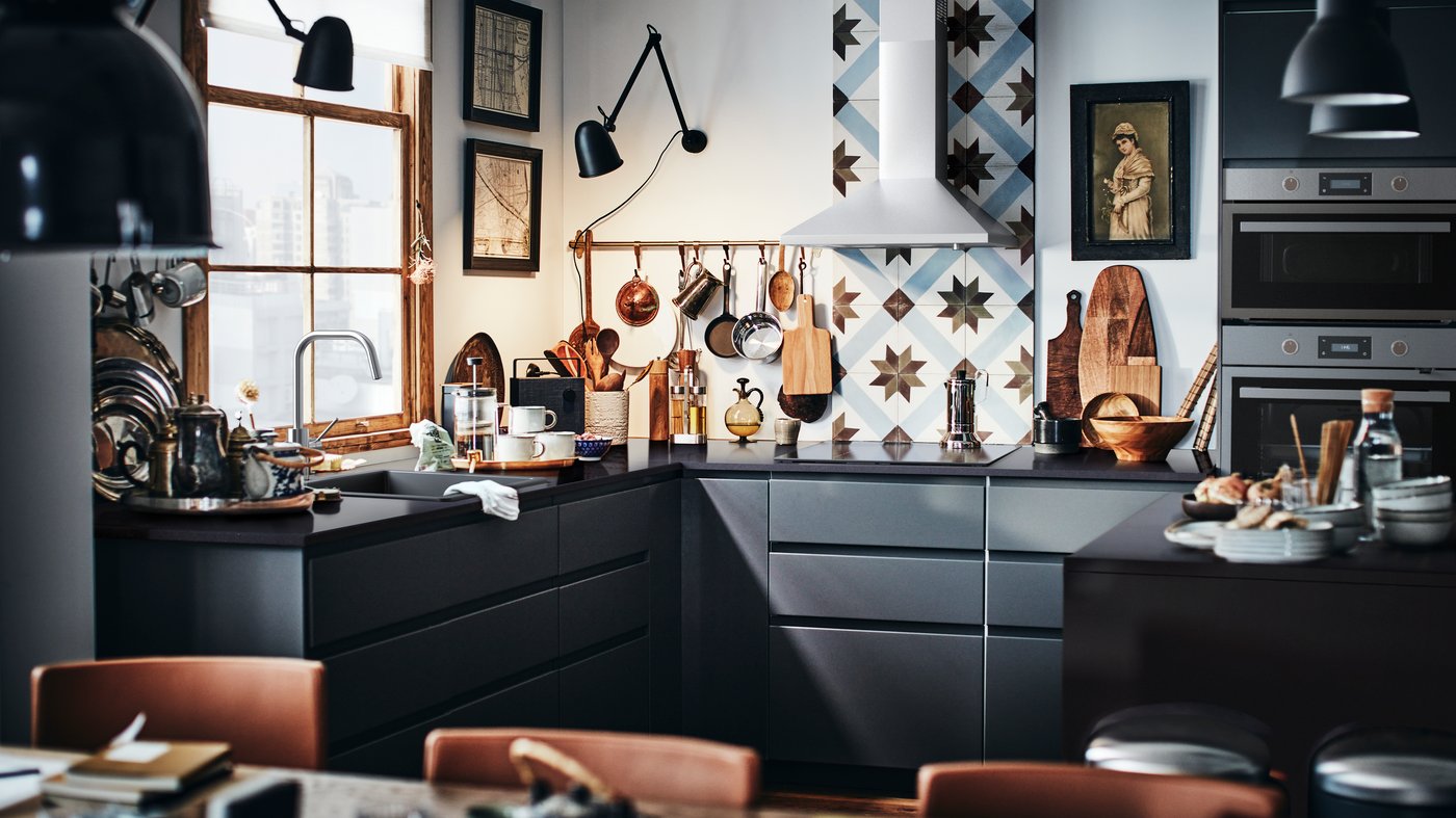 A black SKURUP work/wall lamp