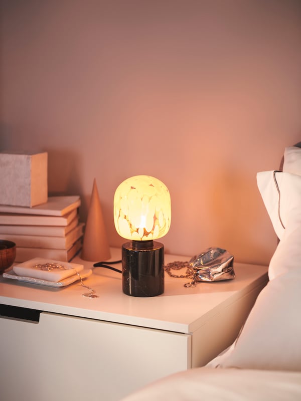 A tube-shaped white/clear glass MOLNART LED bulb E27 240 lumen