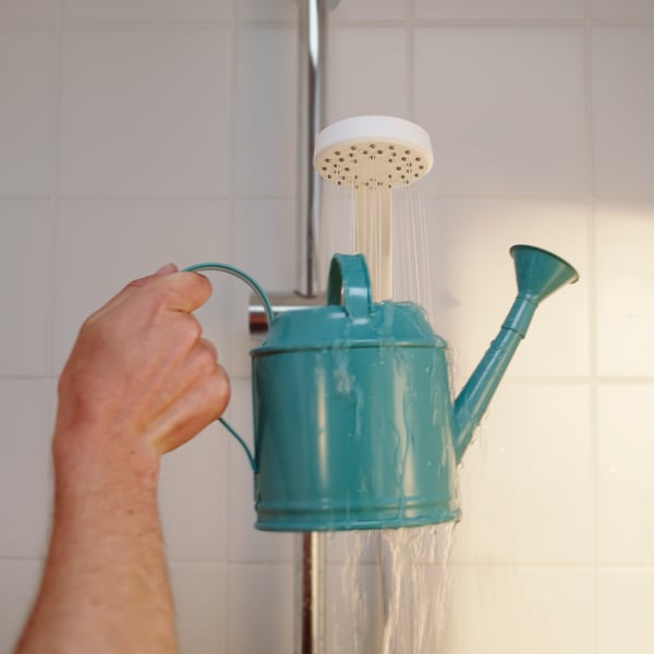 A white LILLREVET single-spray handshower
