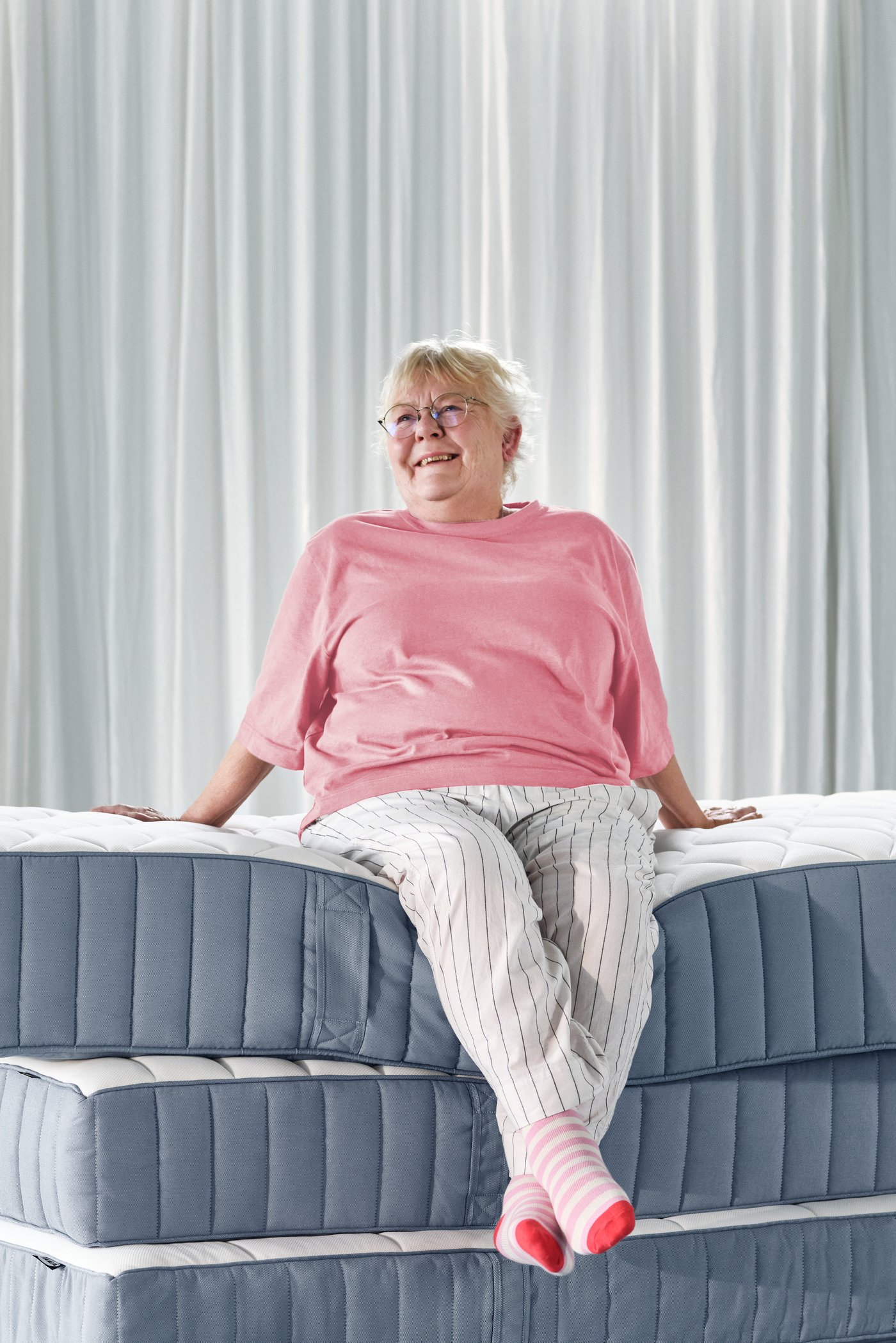 A medium firm/light blue VESTERÖY pocket sprung mattress in the NA
