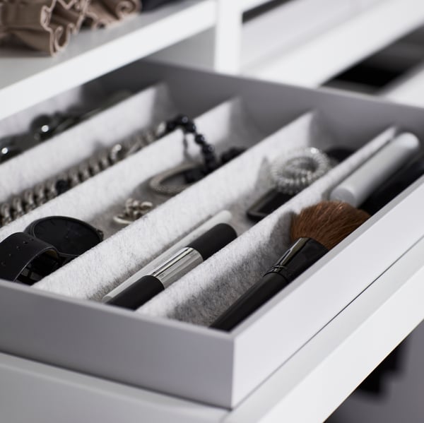 KOMPLEMENT accessories wardrobe organiser with accessories placed inside. 