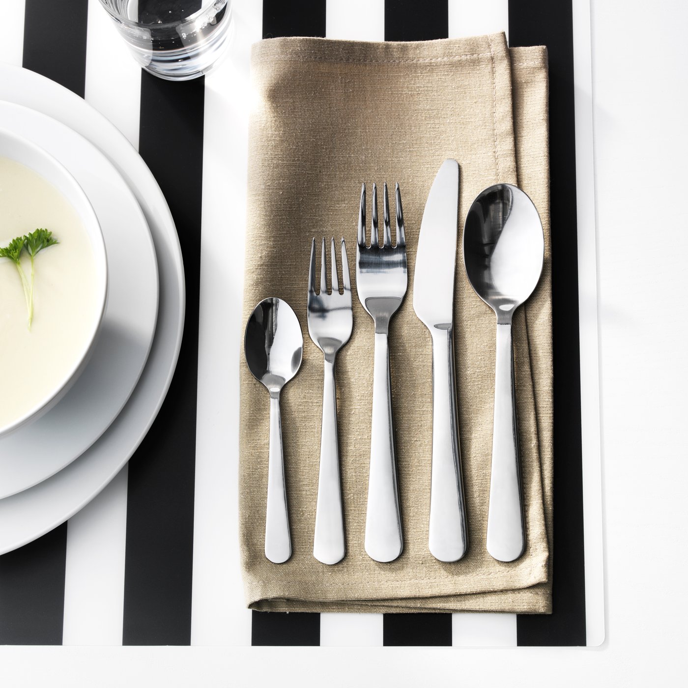 A stainless steel DRAGON 60-piece cutlery set