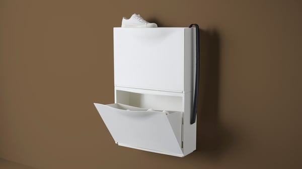 A white TRONES shoe cabinet/storage