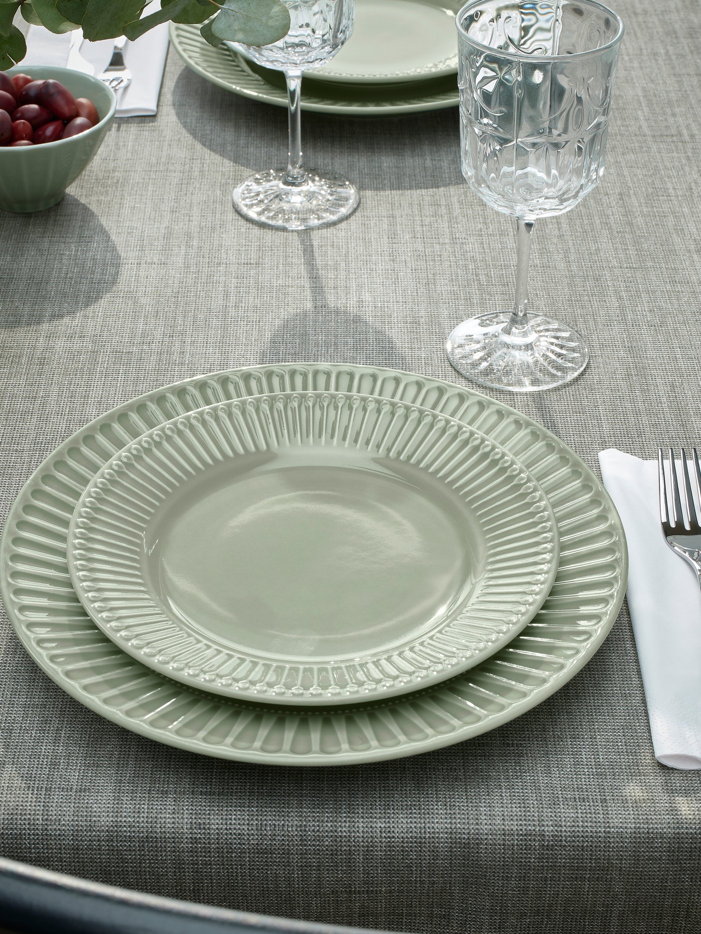 A stoneware pale grey-green STRIMMIG plate