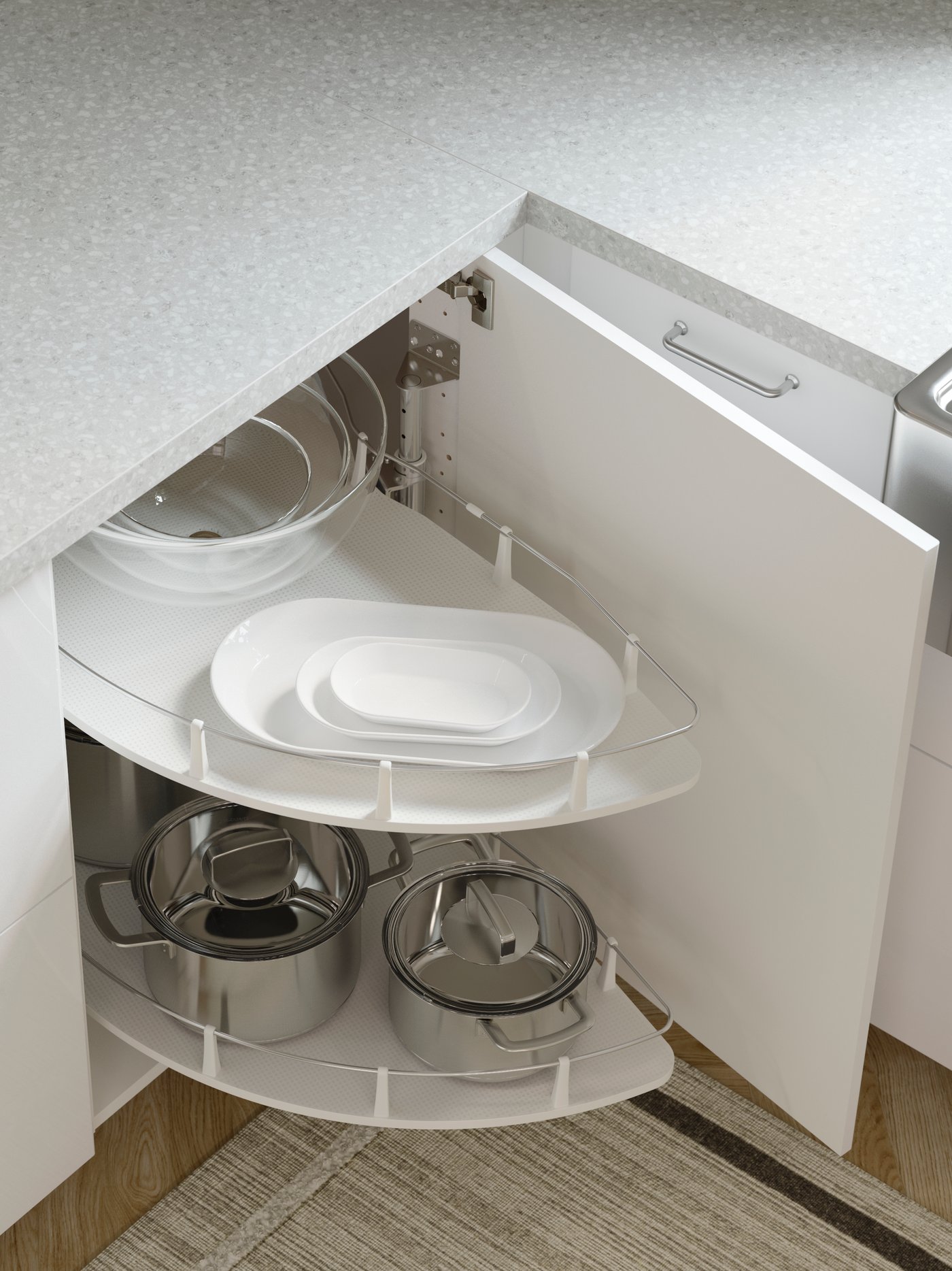 A stainless steel/glass IKEA 365+ pot with lid in the kitchen