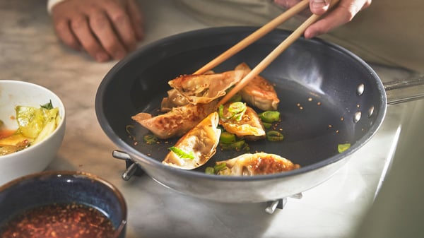 A blue GLADELIG bowl