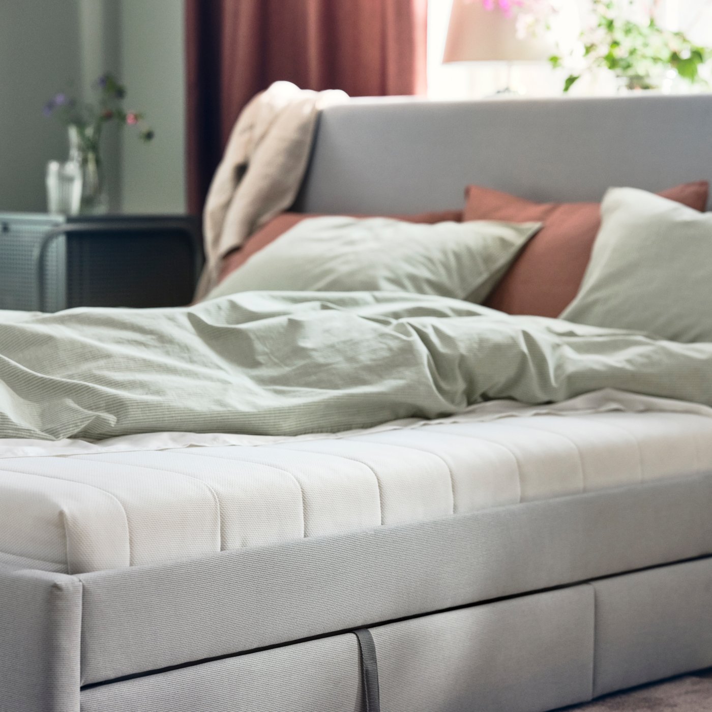 A medium firm/white ÅFJÄLL foam mattress