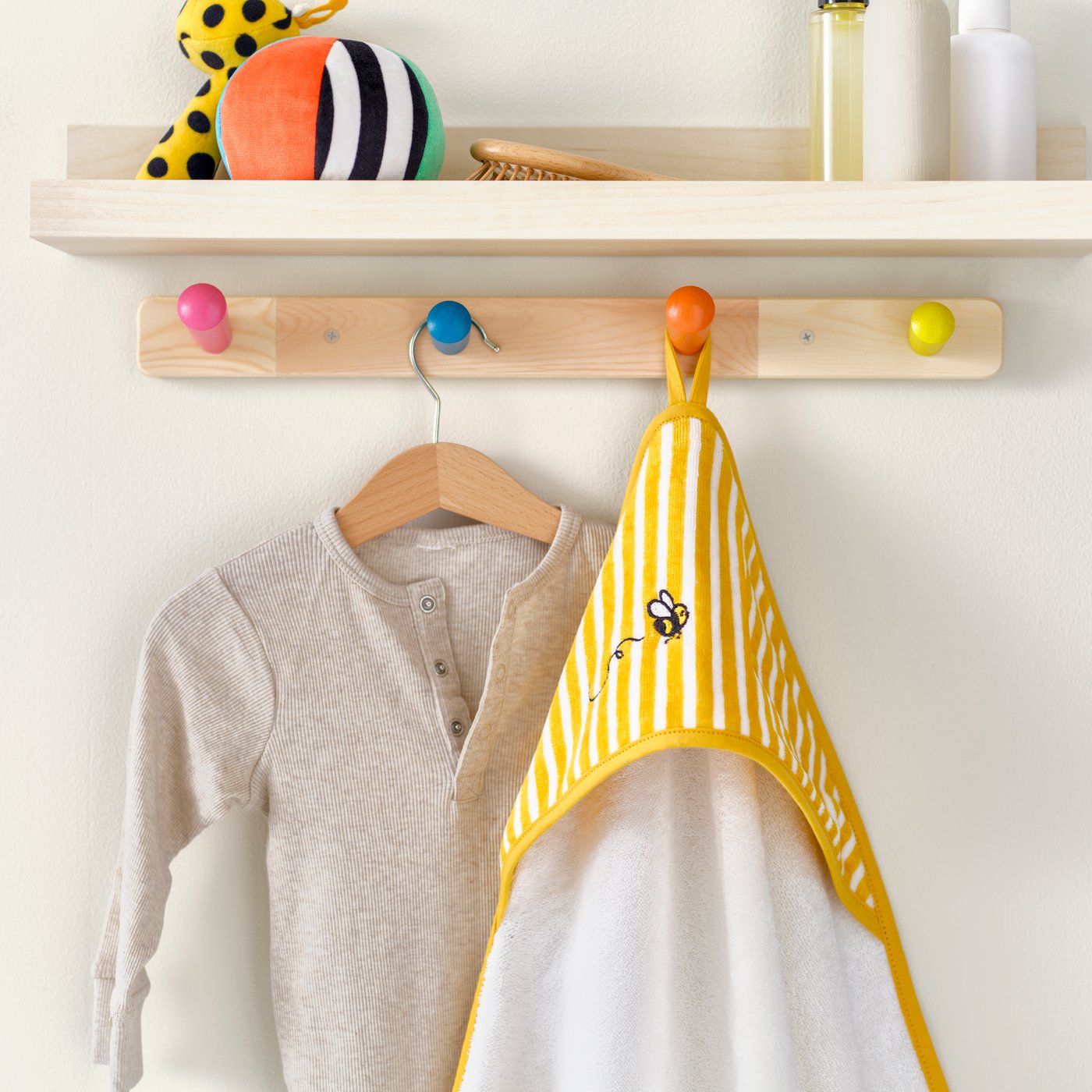 An yellow GRÖNFINK baby towel with hood