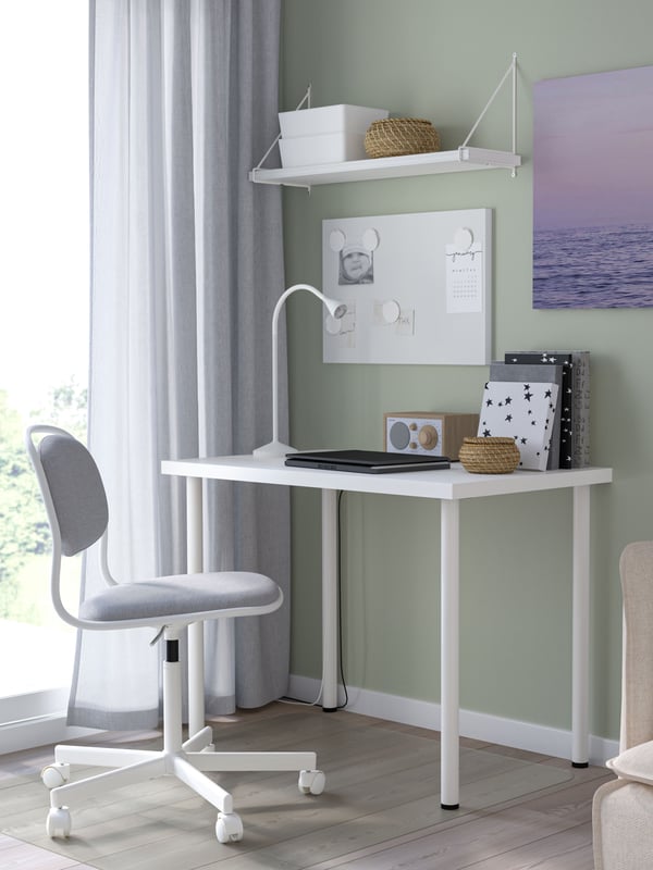 A white NÄVLINGE LED work lamp