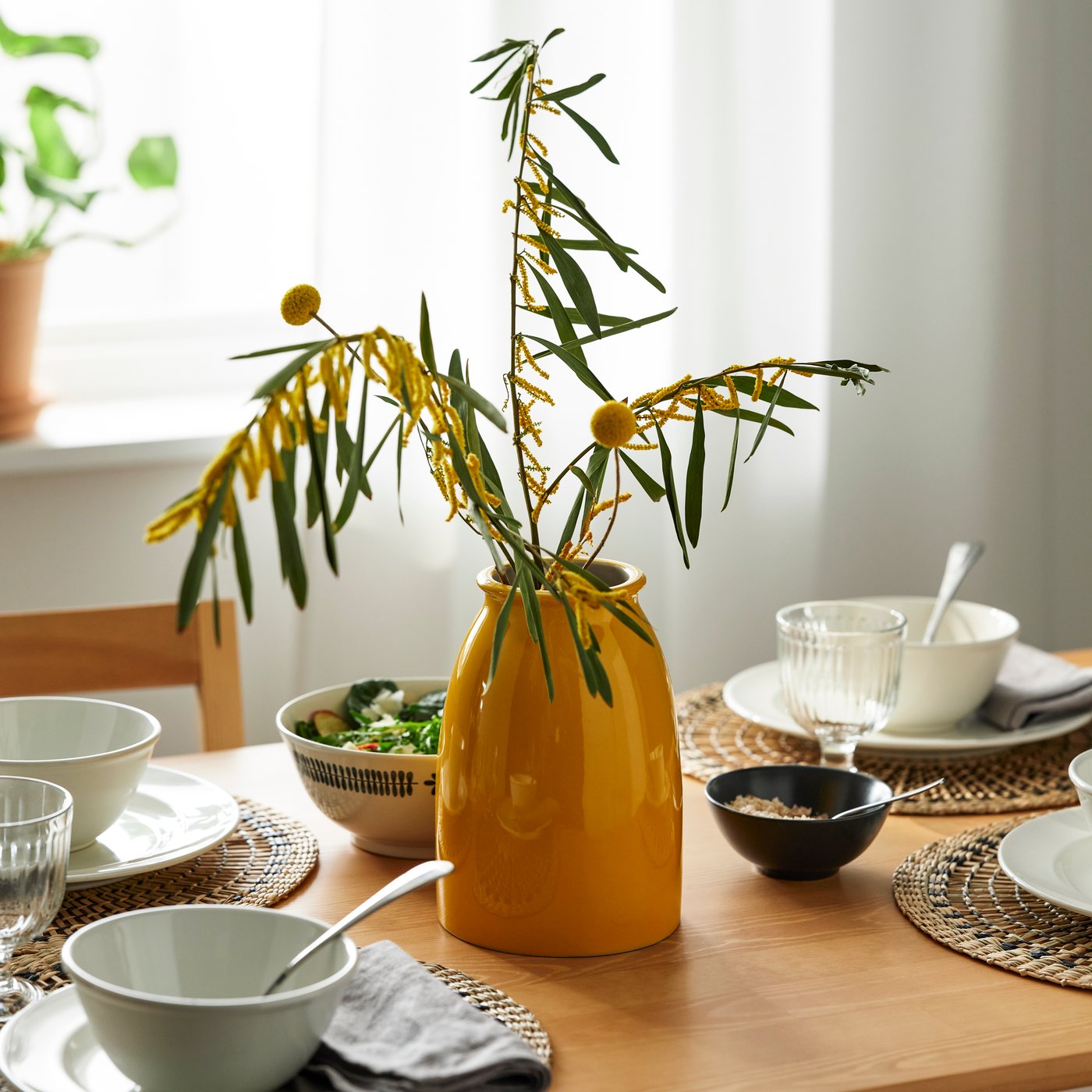 A bright yellow KOPPARBJÖRK vase