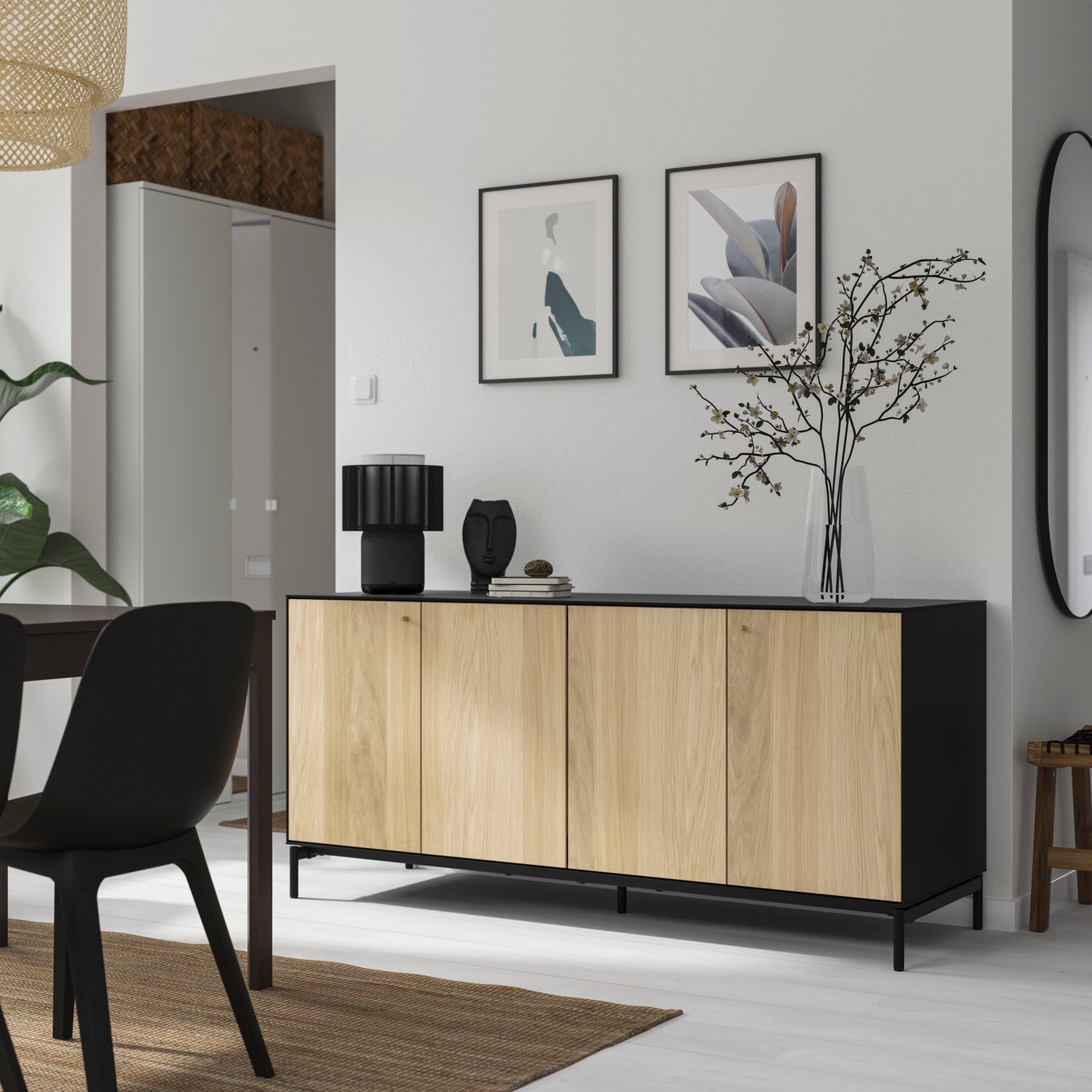 A black/oak veneer BOASTAD sideboard