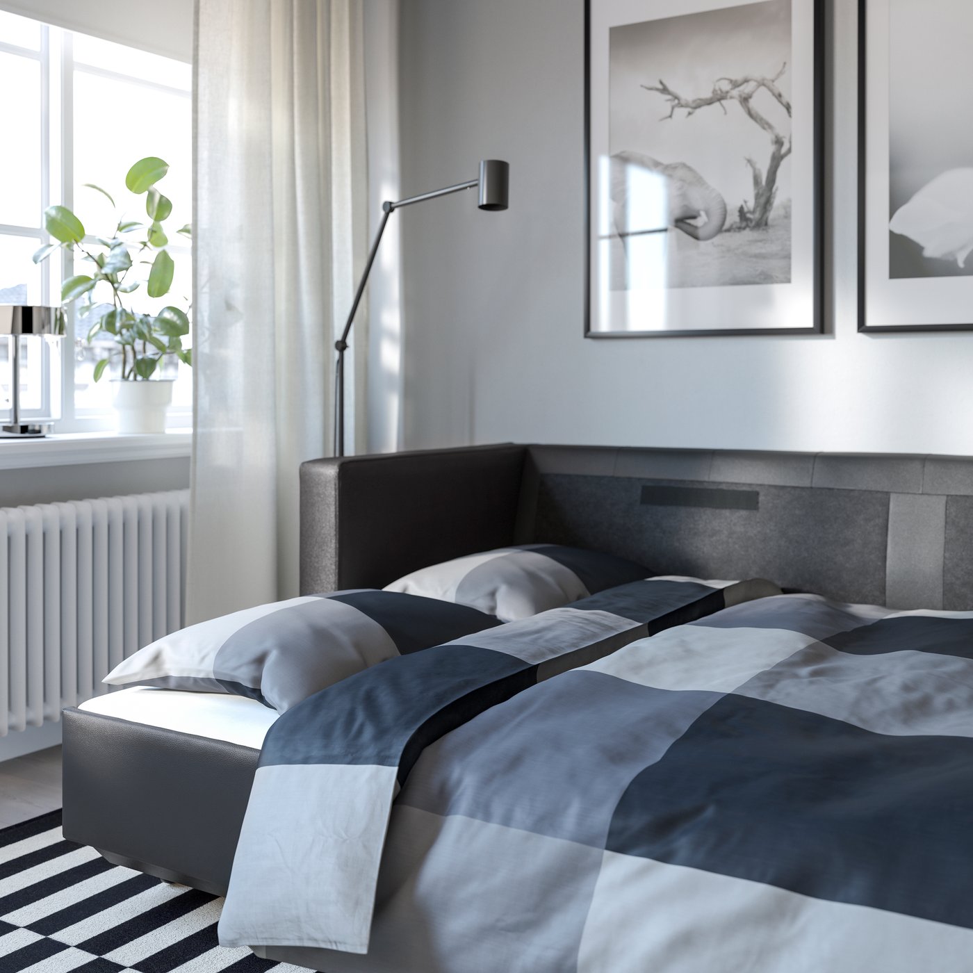 A Grann/Bomstad black/metal MORABO 3-seat sofa-bed