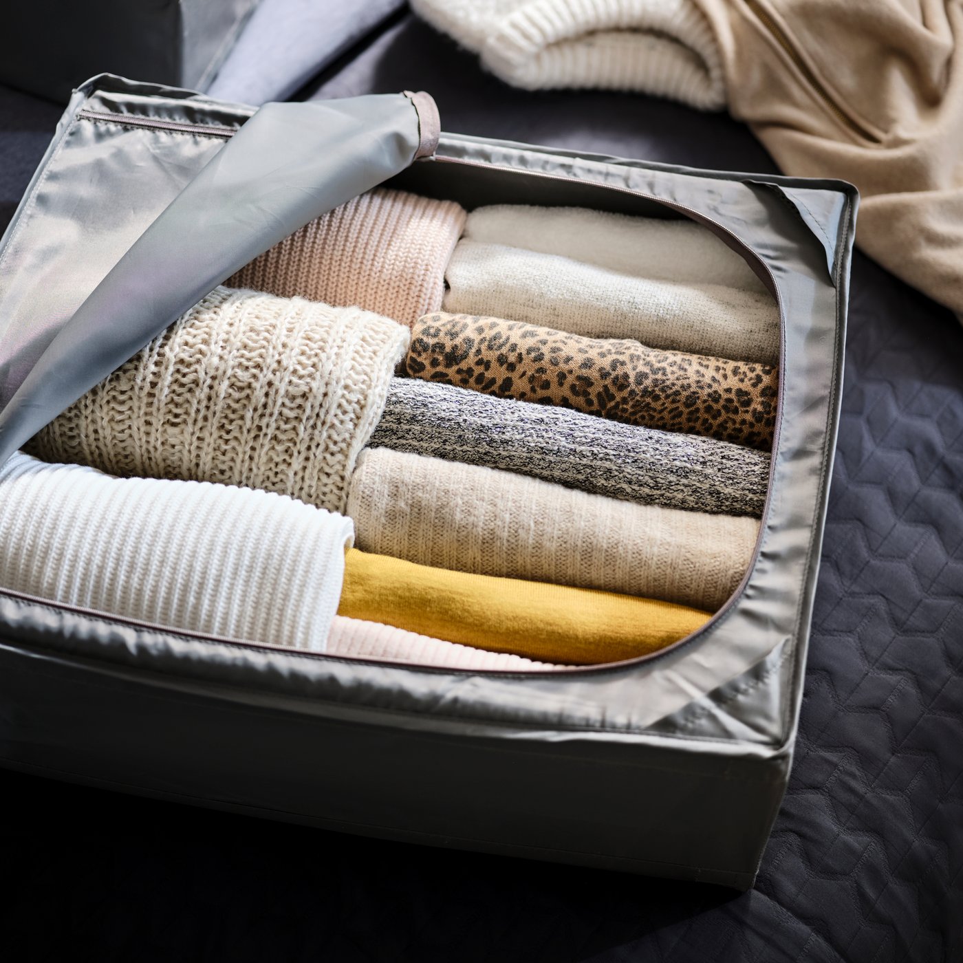 A dark grey SKUBB storage case