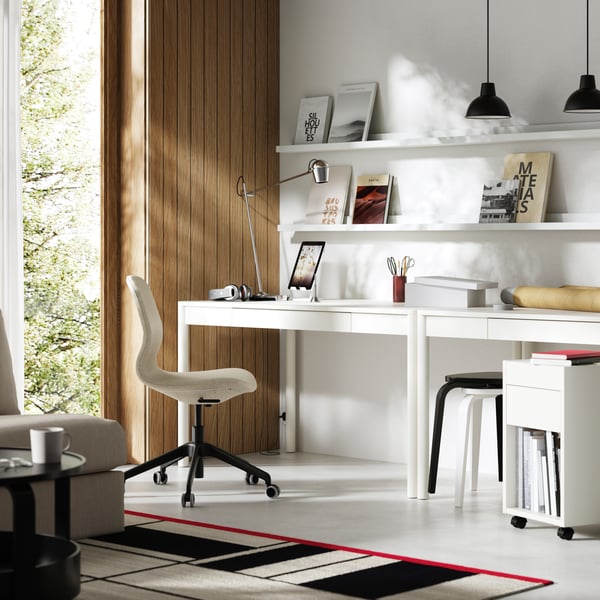 An off-white TONSTAD desk in the home office