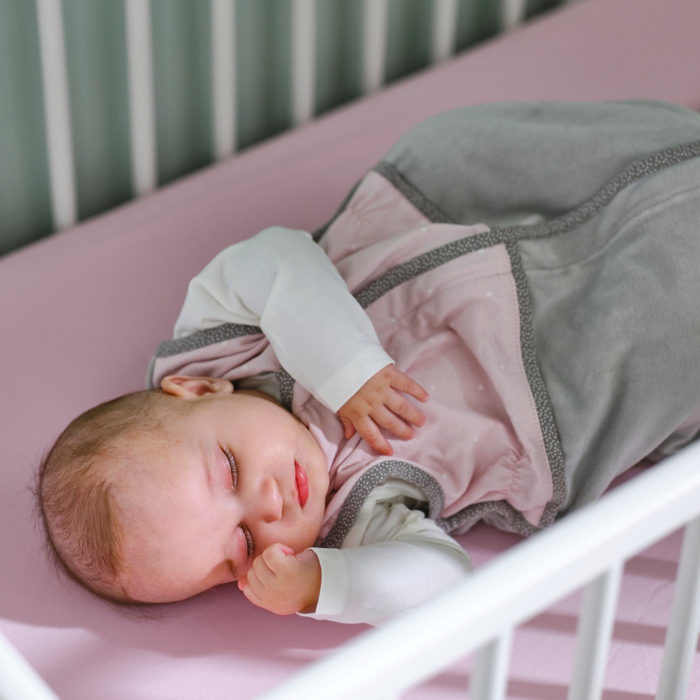 A pink LEN sleep bag
