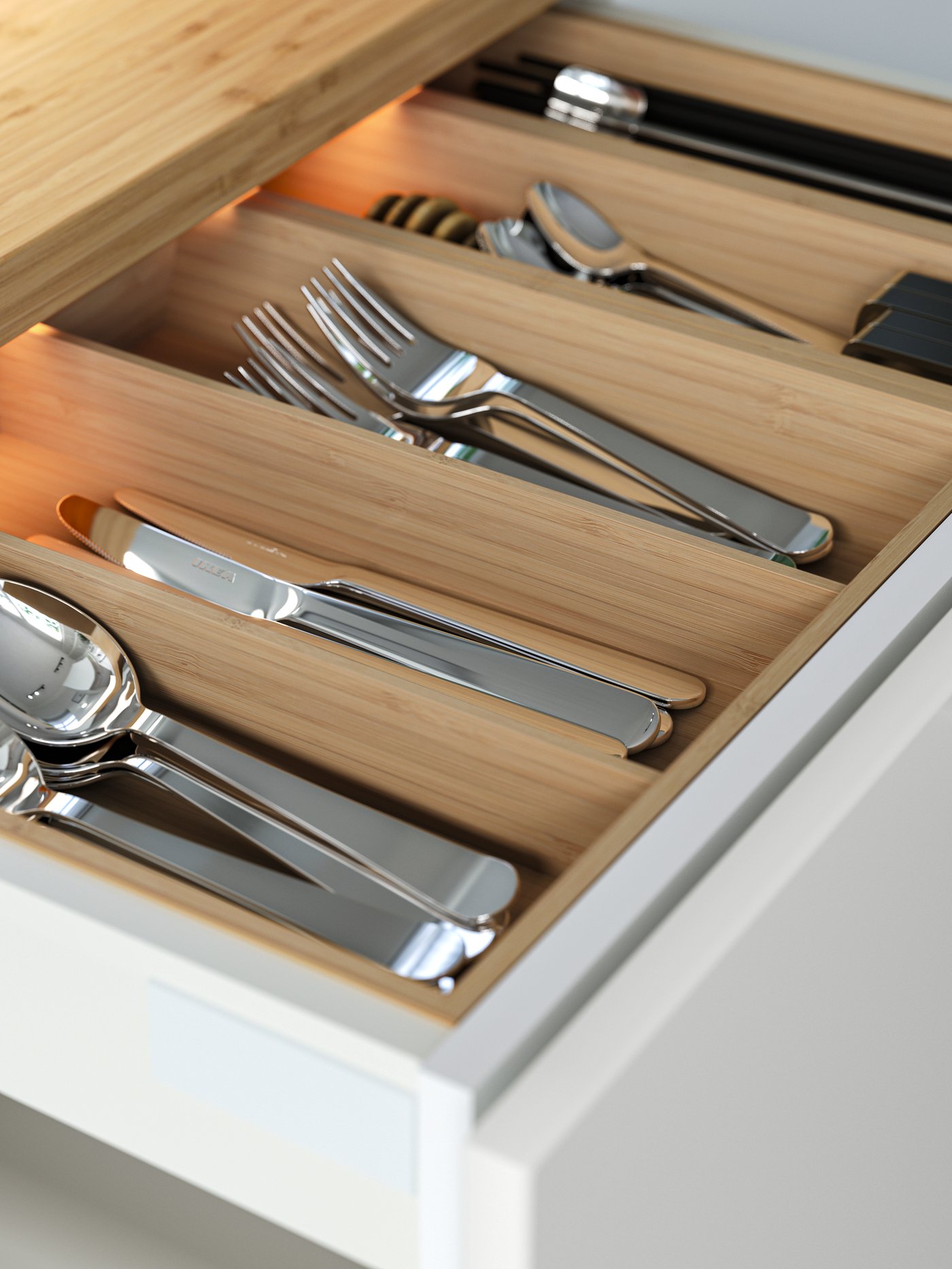 A stainless steel DRAGON 24-piece cutlery set in the kitchen