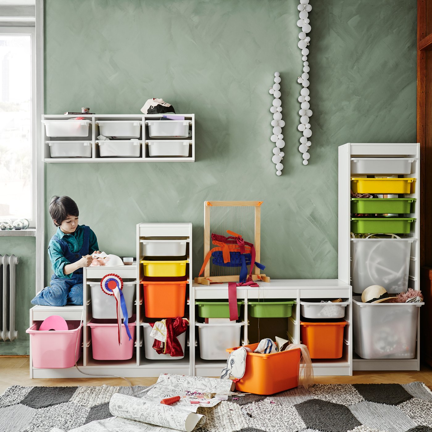 TROFAST toy storage solution with TROFAST boxes with toys and child