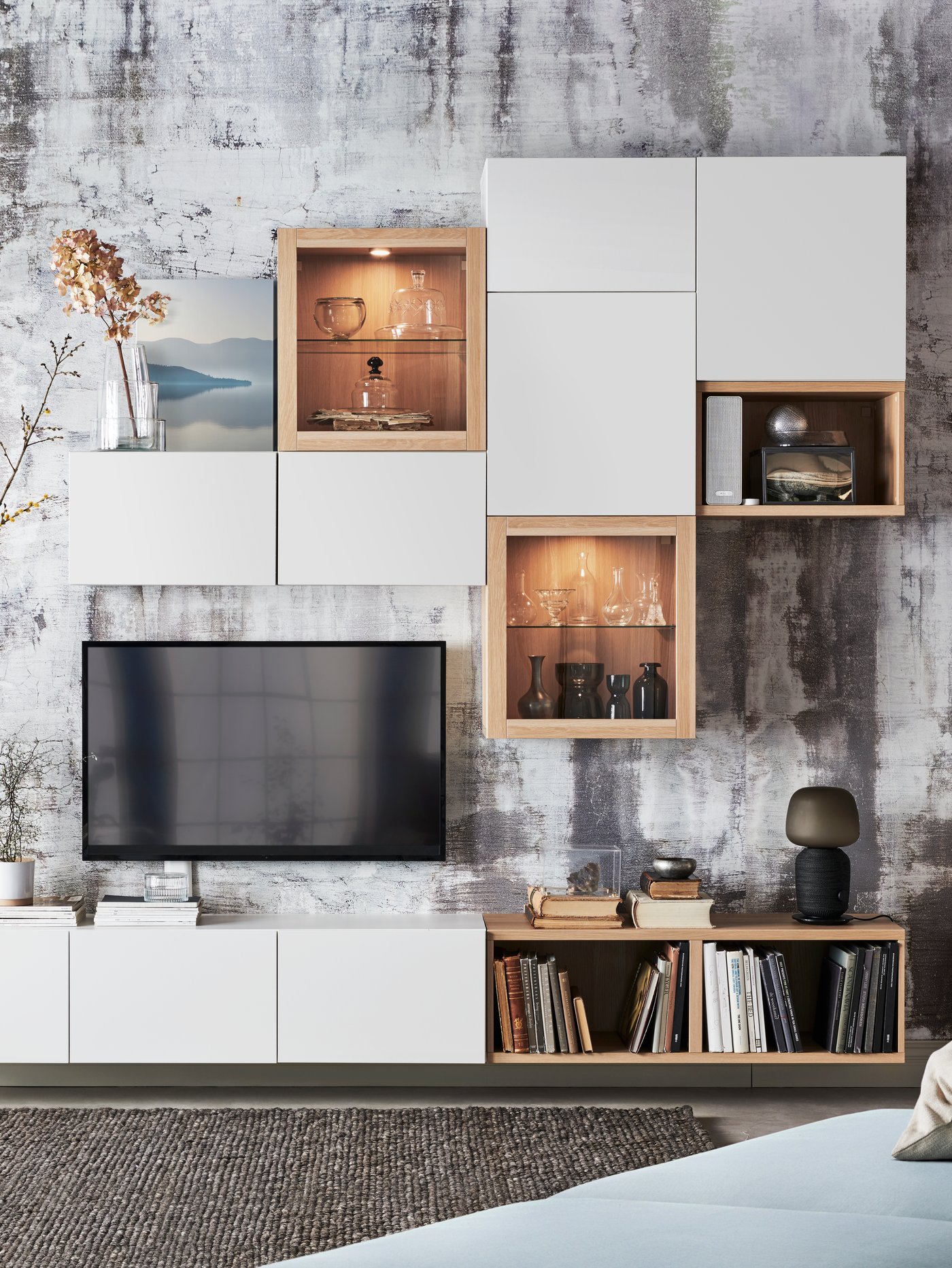 A white/Lappviken white BESTÅ TV bench with doors in the living room