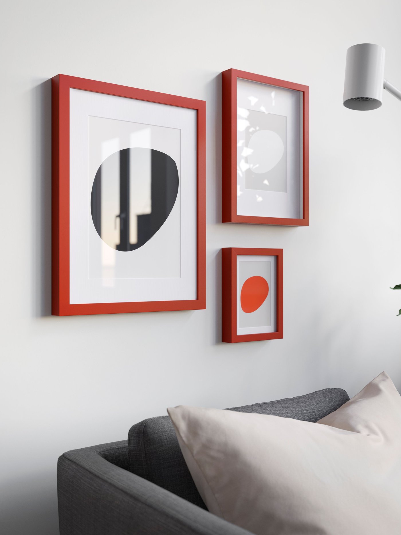 IKEA RÖDALM red frame with other red frames on the wall behind a sofa in the living room.