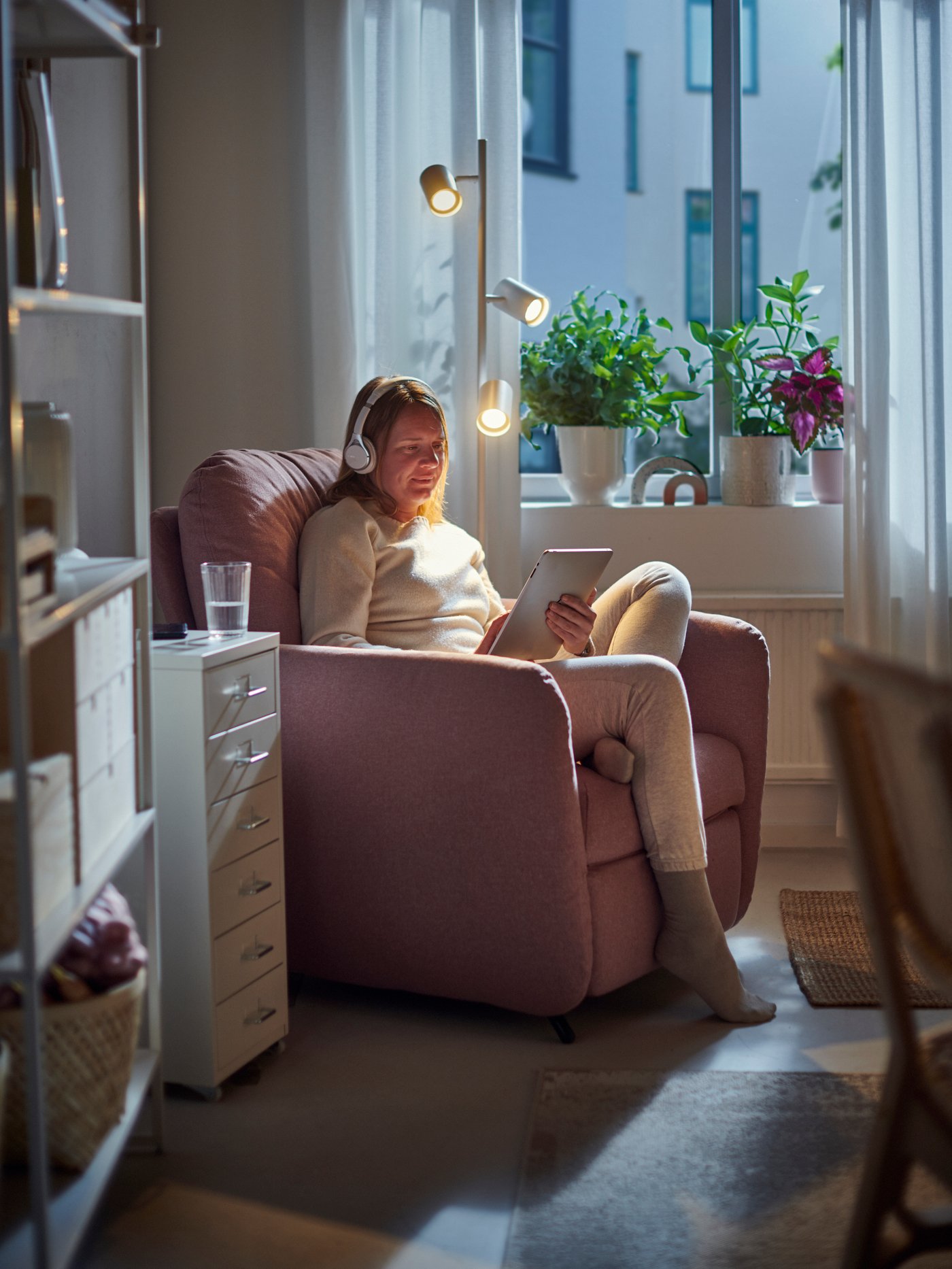 A white NYMÅNE floor lamp with 3-spot