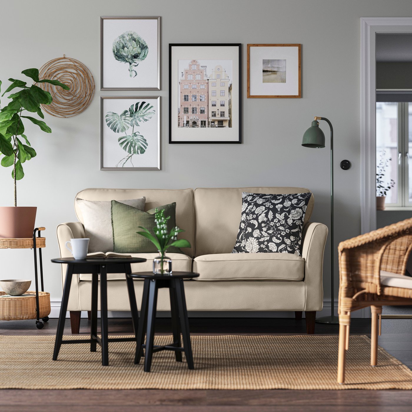 A Hakebo beige EKHOLMA 2-seat sofa in the living room
