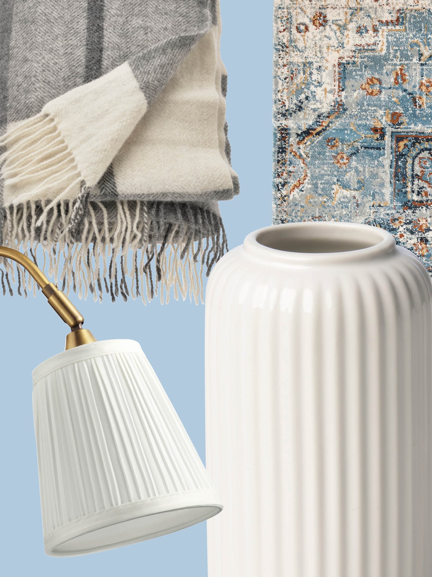 A mix of a ribbed white vase, a classic lampshade, a soft throw and an oriental‑inspired rug showcases the timeless, cozy atmosphere you can create with IKEA accessories.