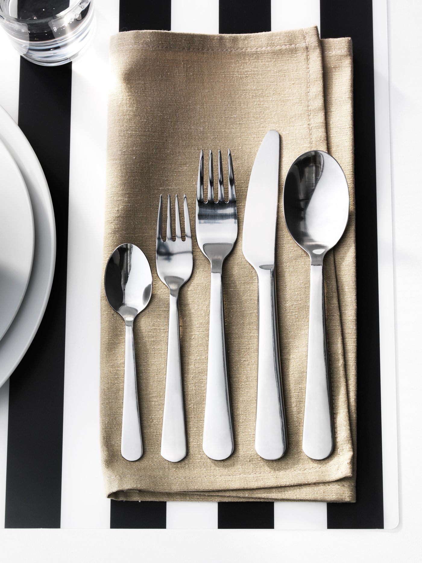 A stainless steel DRAGON 60-piece cutlery set