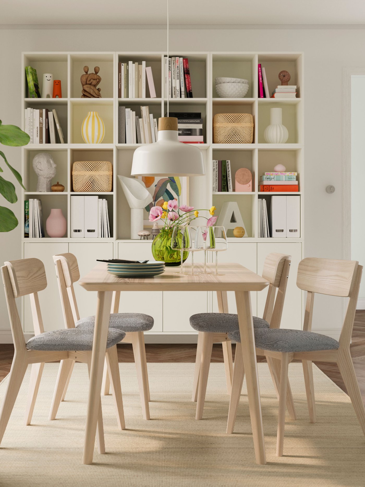 A white EKET wall-mounted shelving unit in the dining room