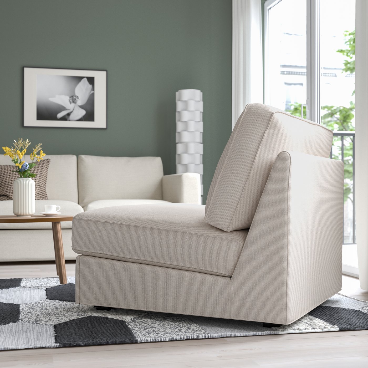 A white chaise lounge in a bright living room.