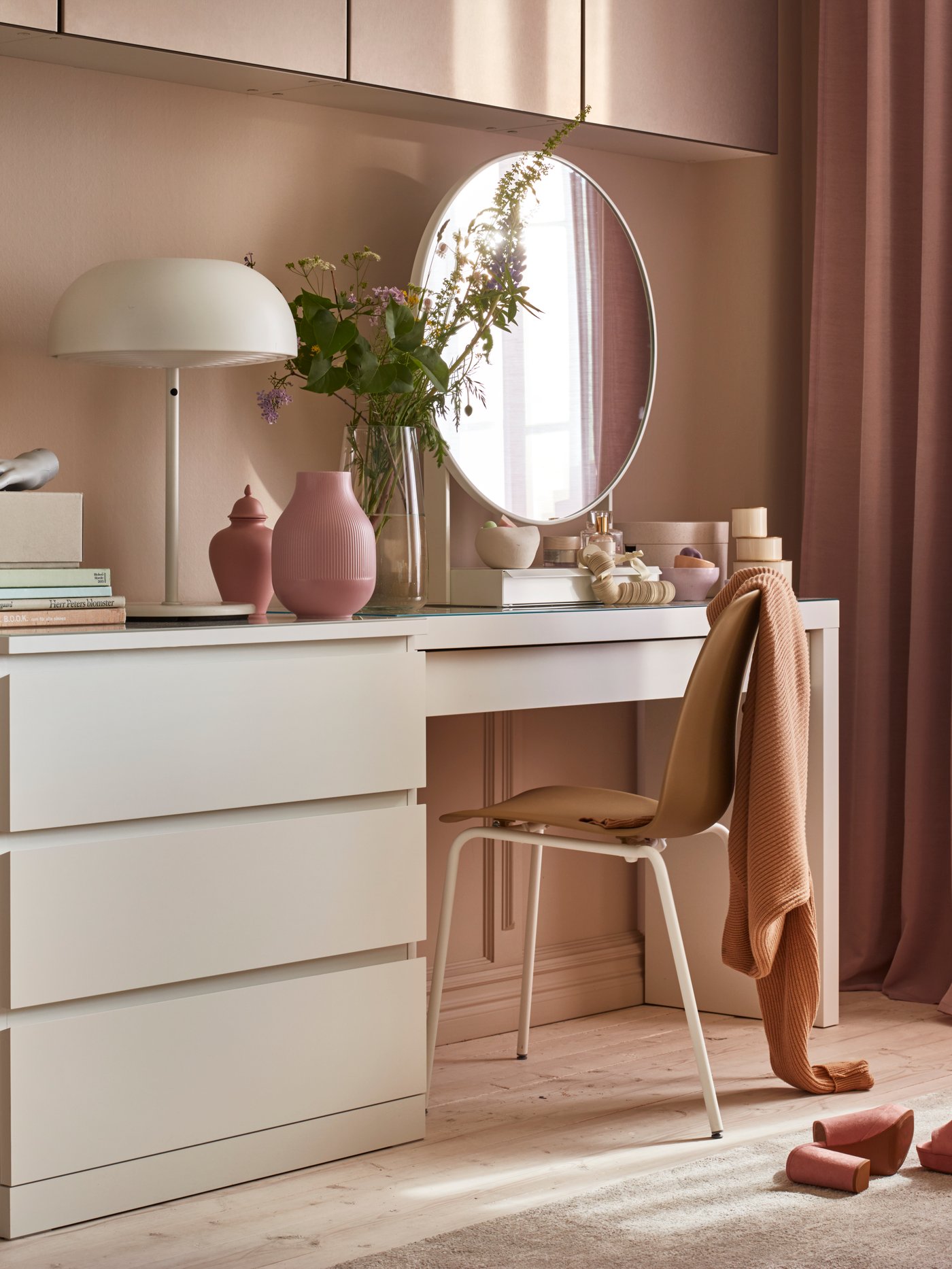 A white MALM dressing table in the bedroom
