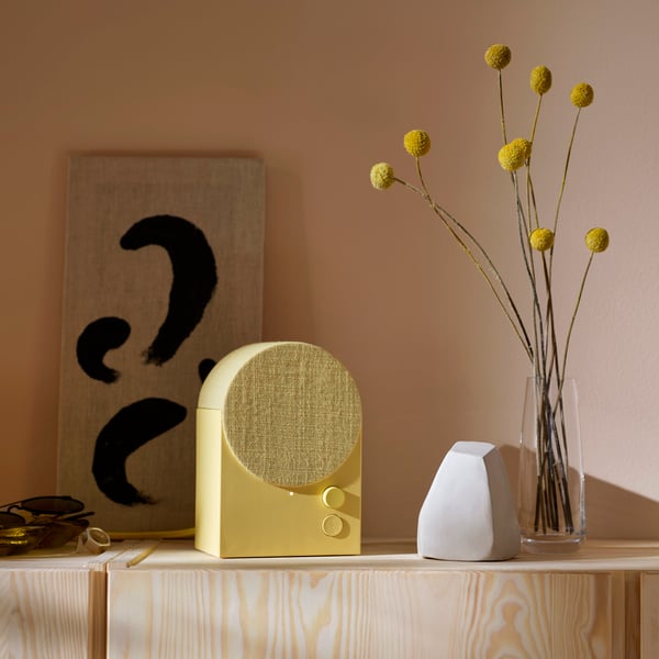 An yellow NATTBAD Bluetooth speaker