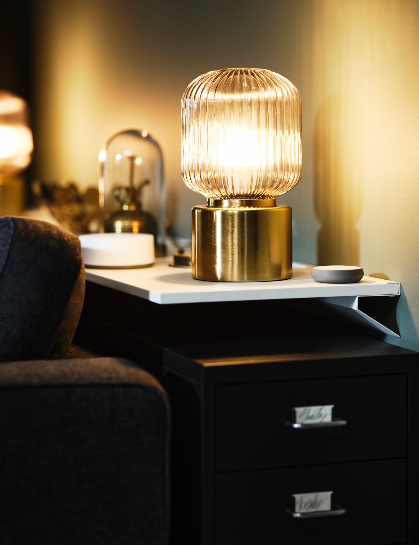 A brass/grey clear glass SOLKLINT table lamp
