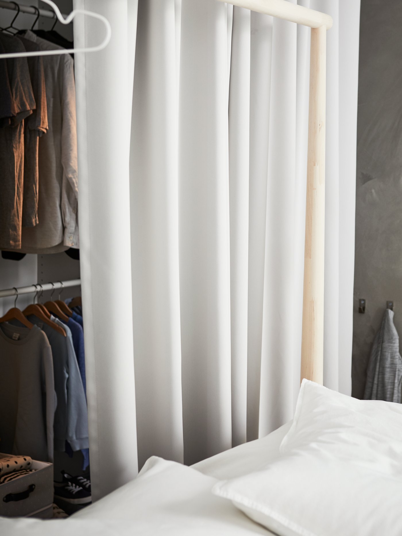 A birch/Luröy GJÖRA bed frame in the bedroom