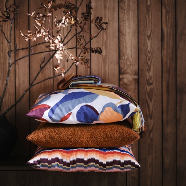 A multicolour PEKINGSYREN cushion cover in the NA