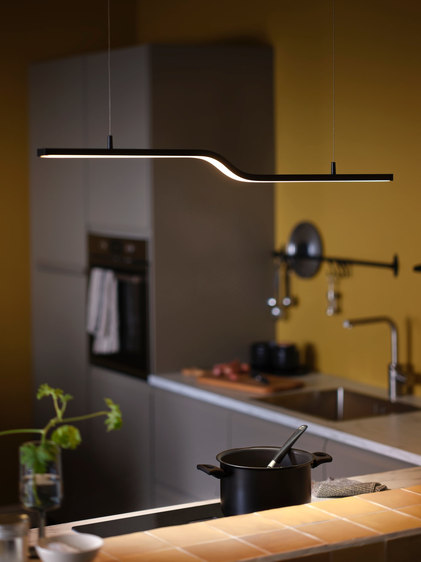 A smart black PILSKOTT LED pendant lamp