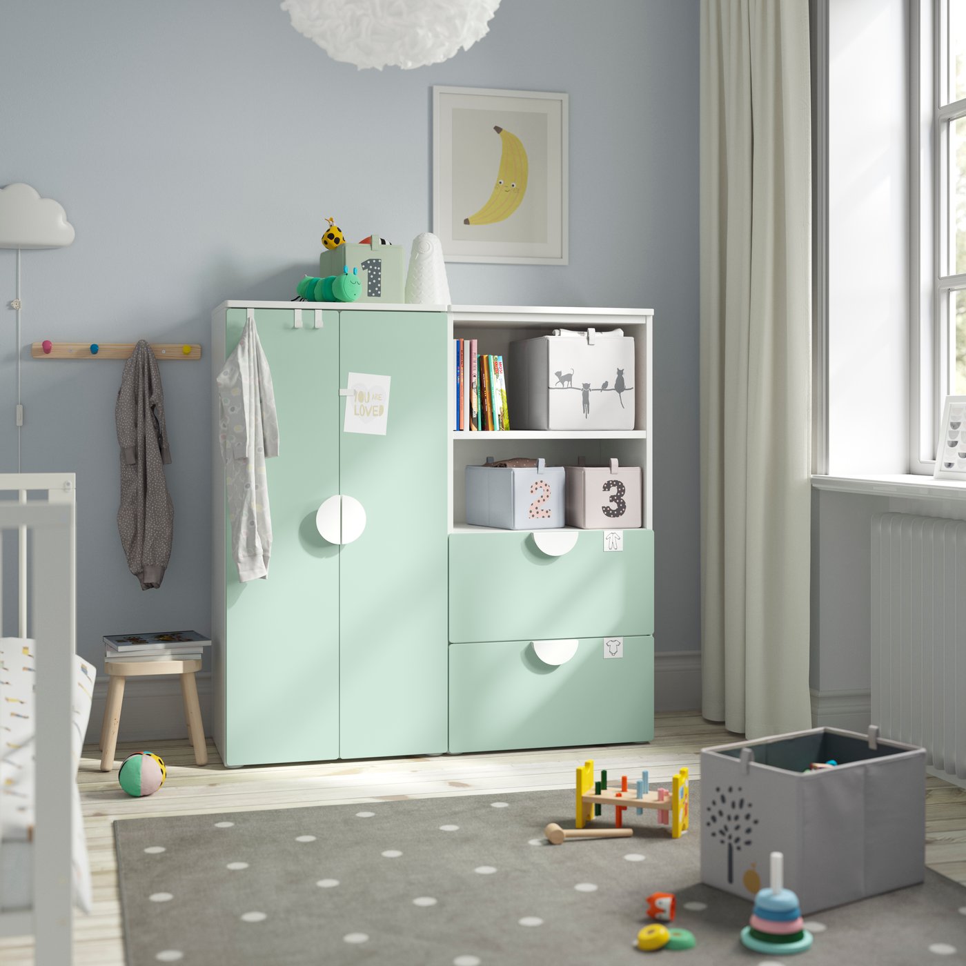 A white/light green PLATSA storage combination